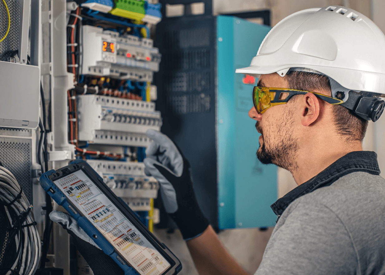 Projects 6 Man Electrical Technician Working Switchboard With
